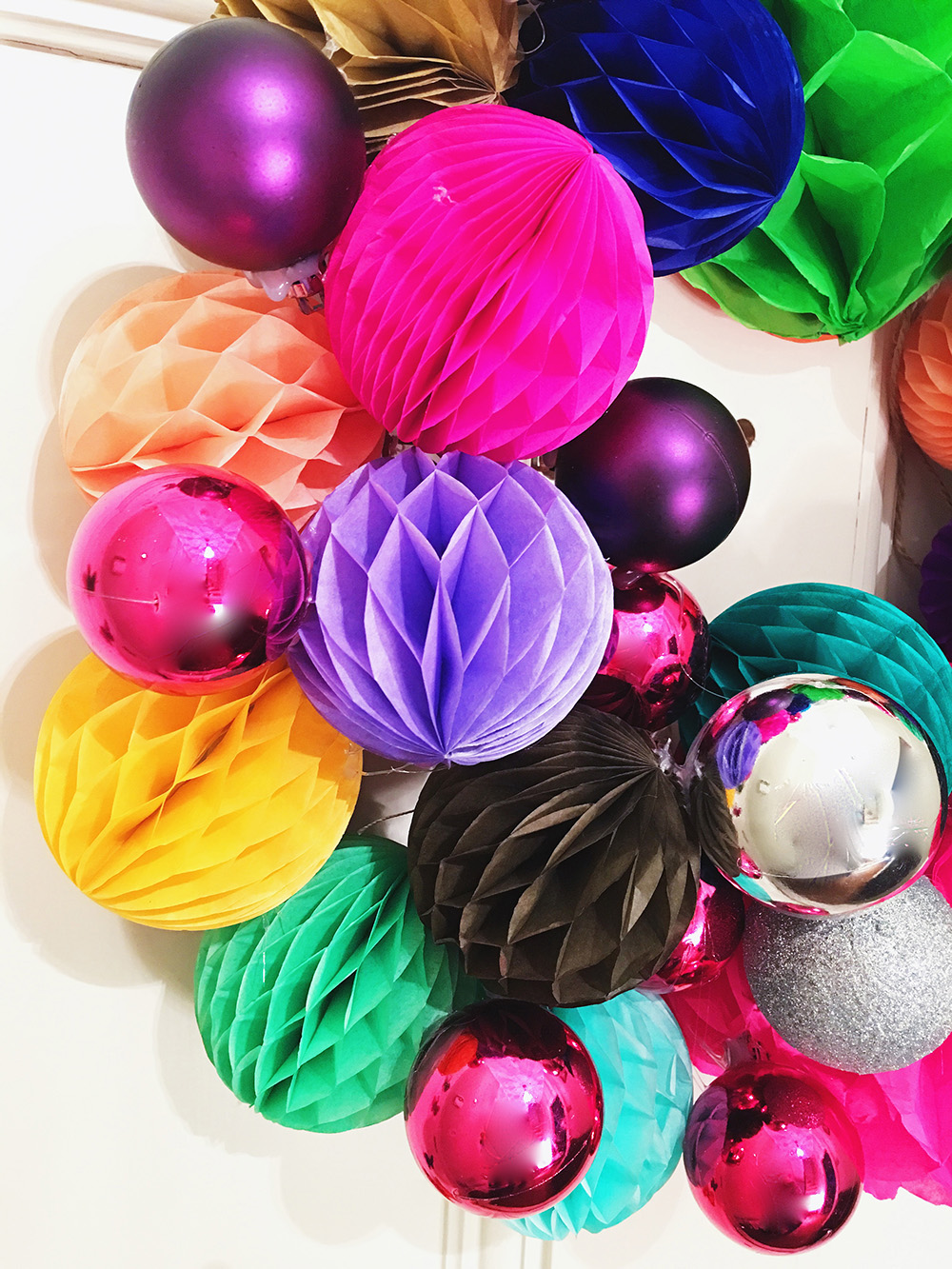 If you want a colourful Christmas, then this honeycomb pom-pom wreath might just be for you!