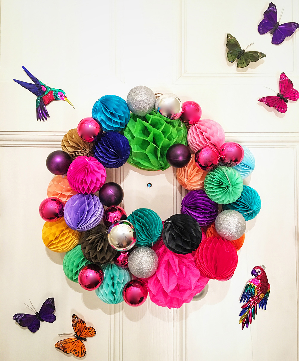 If you want a colourful Christmas, then this honeycomb pom-pom wreath might just be for you!