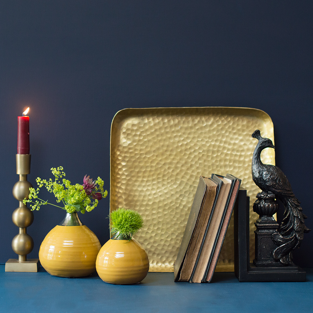 A tray will instantly improve any vignette, they add substance and ground it to the space.