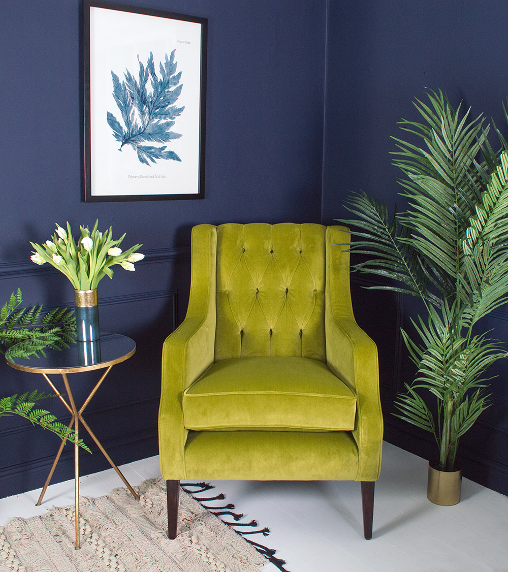Soft touch velvet in a deliciously vibrant green, enhances the deep button back of this winged back armchair and gives a twist of modernity to a classic that is sure to become a favourite for curling up in with a good book or for catching up with your favourite boxed set.