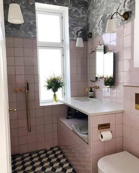 For a subtle and stylish bathroom, soft pink and black has echoes of the jazz age and makes a relaxing and calming space.