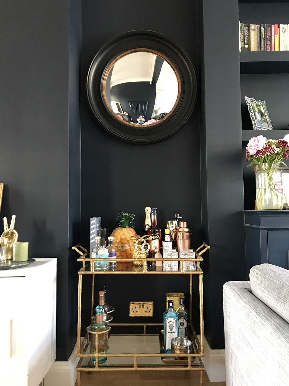 After: Living room transformation. Opulent gold accessories paired with Basalt by Little Greene, for a contemporary and stylish living room.