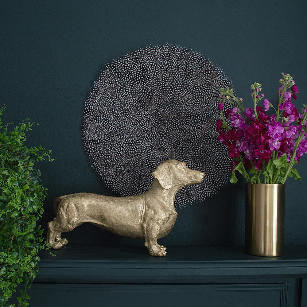 Audenza- Top 10 Cool Homewares Under £50. A dashing gold decorative dachshund dog.