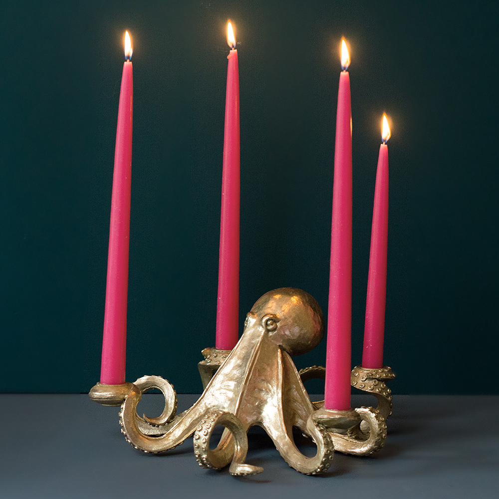Audenza- Top 10 Cool Homewares Under £50. Quirky gold octopus four candle centrepiece perfect for dinner parties.