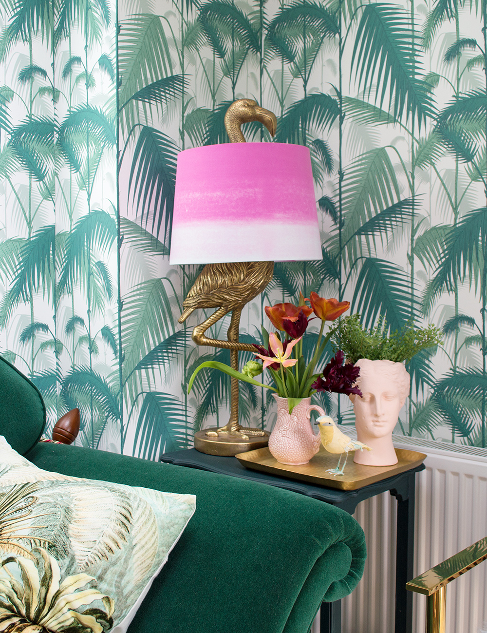 Tropical living room inspiration featuring a flamingo lamp by Audenza and Palm Jungle wallpaper by Cole & Son