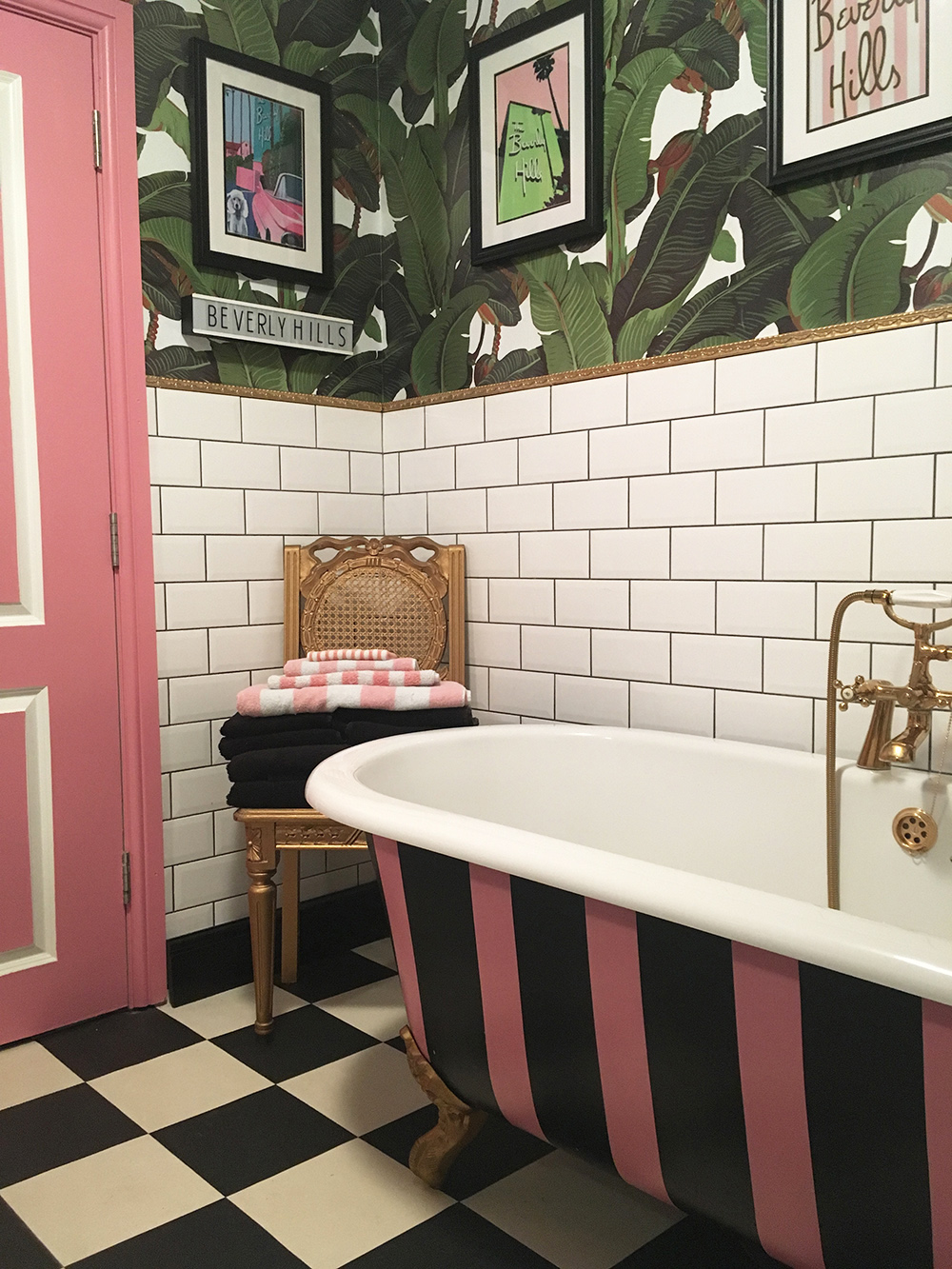 House tour- opulent and eccentric décor. Tropical banana leaf wallpaper in the bathroom with pink accents.