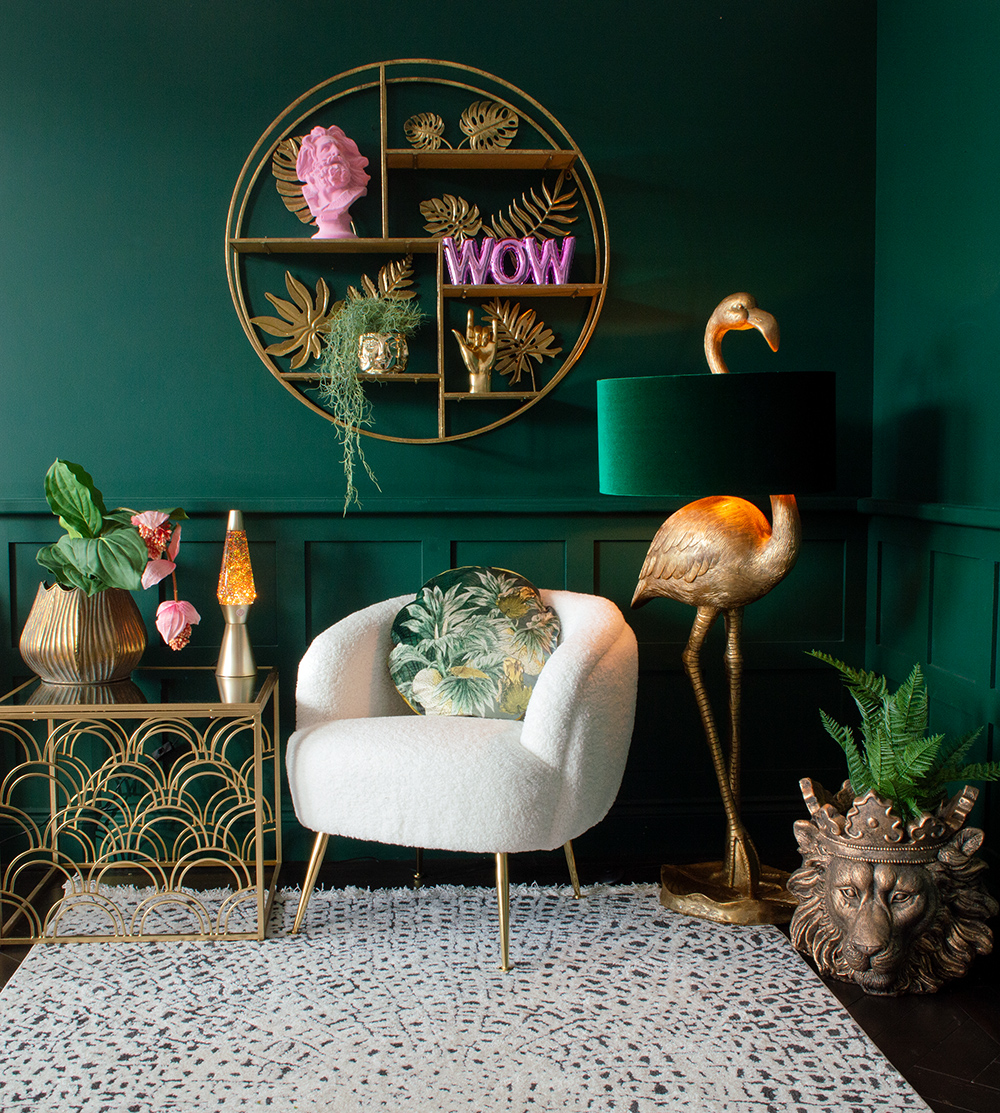 Quirky living room with colourful home accessories and furniture by Audenza. Our white faux sheepskin chair looks fab styled with our colourful, flamingo floor lamp and Aslan lion planter