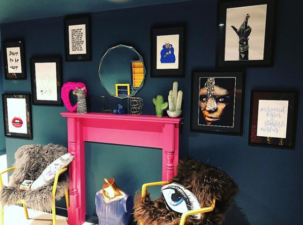 Quirky gallery wall with pops of colour. Image by @thelittlebluebeautyroom