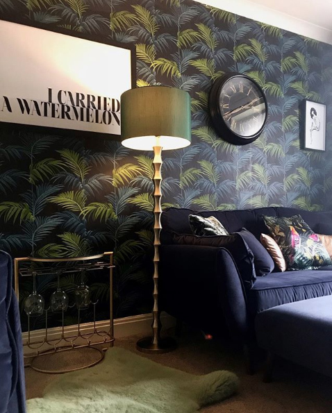 Moody living room with tropical wallpaper and drinks table by Audenza. Image by @vic_at_number_46