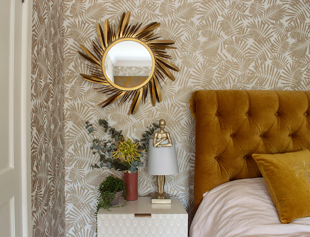 Bedroom inspiration - mustard velvet bed with gold patterned wallpaper.