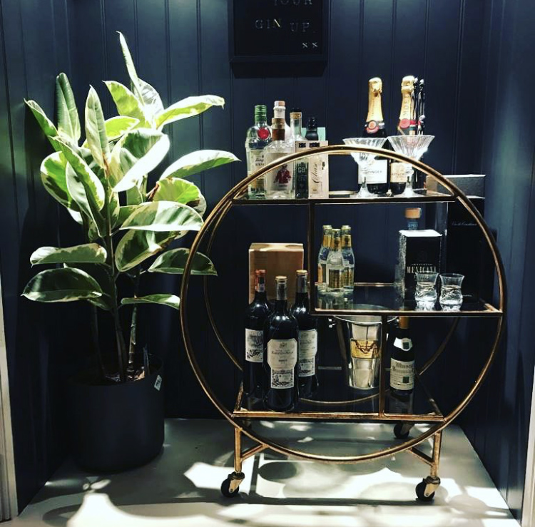 Dark and moody bar cart styling inspiration. Bar cart from Audenza