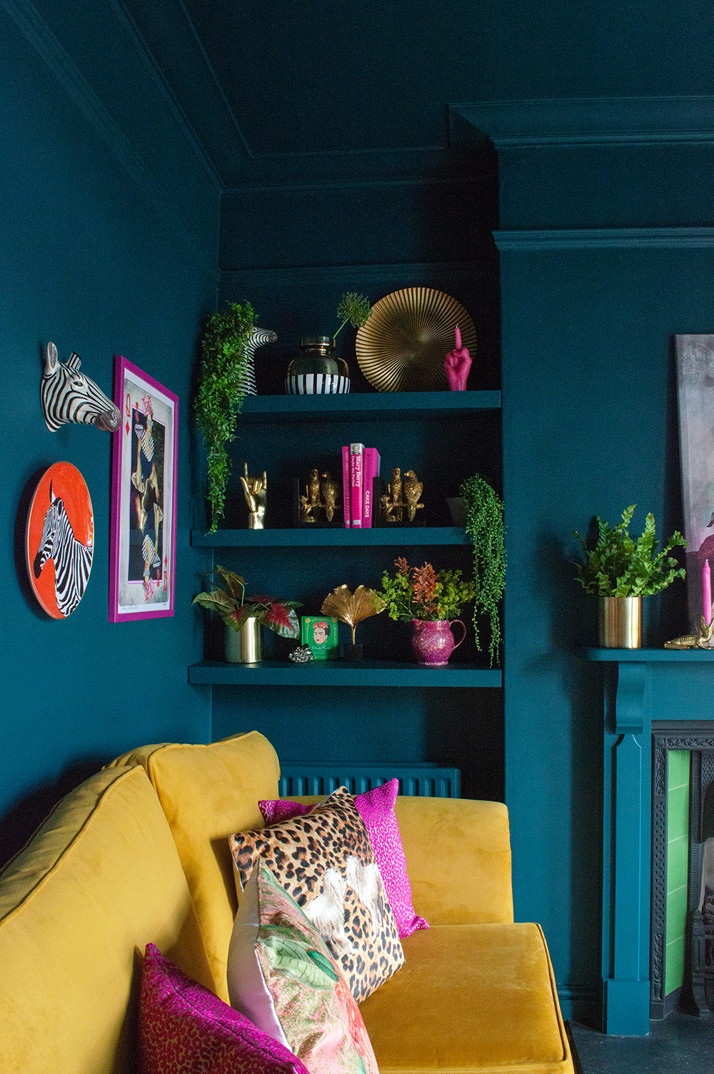 Teal and mustard living room. Colourful, maximalist decor inspiration with quirky prints and home accessories from Audenza.