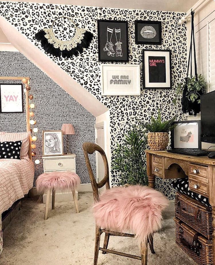 Feminine bedroom inspiration with monochrome leopard print wallpaper and blush pink accents.