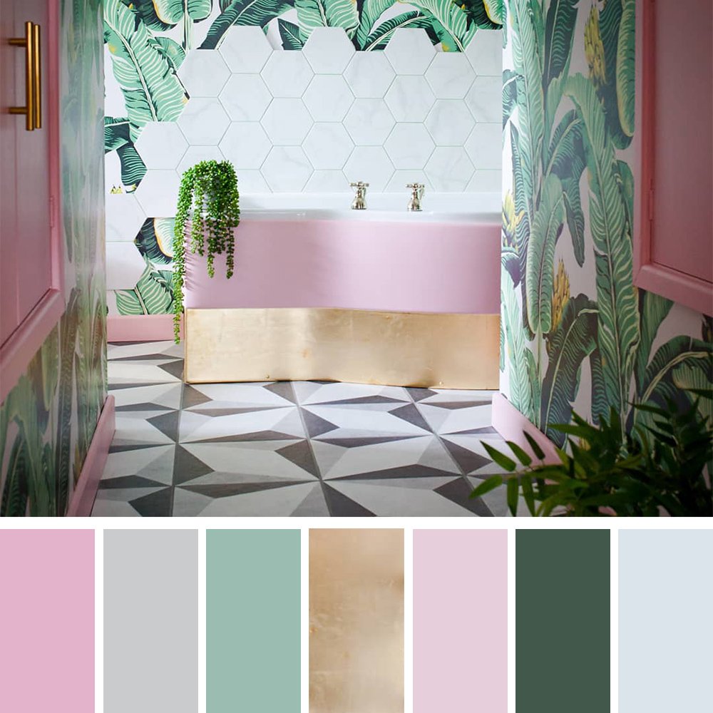 Tropical colour palette inspiration - blush pink, gold and green tropical bathroom with banana leaf patterned wallpaper and monochrome floor tiles.