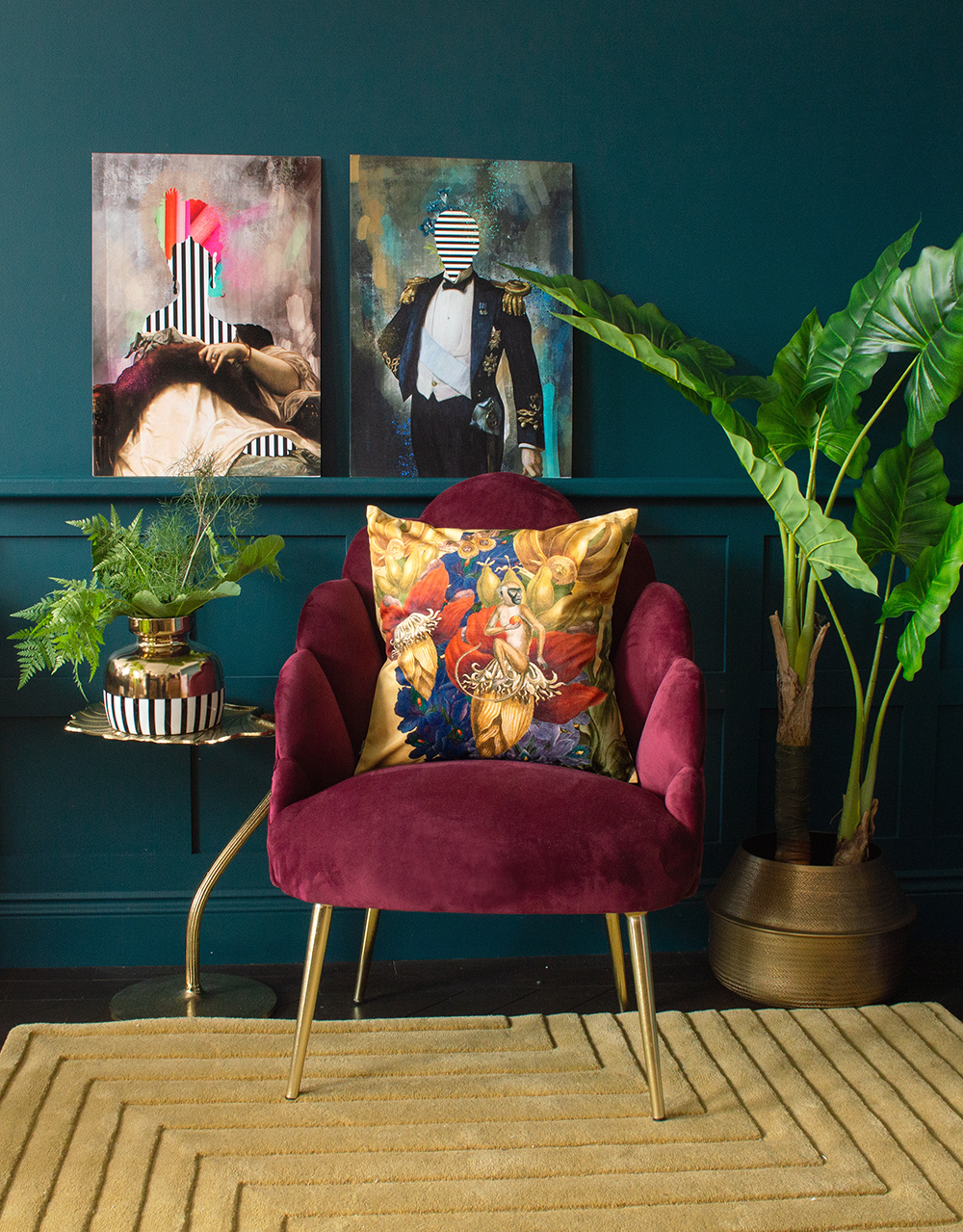 Cool, quirky prints. Moody, blue living room with unusual Duke and Duchess art prints. 