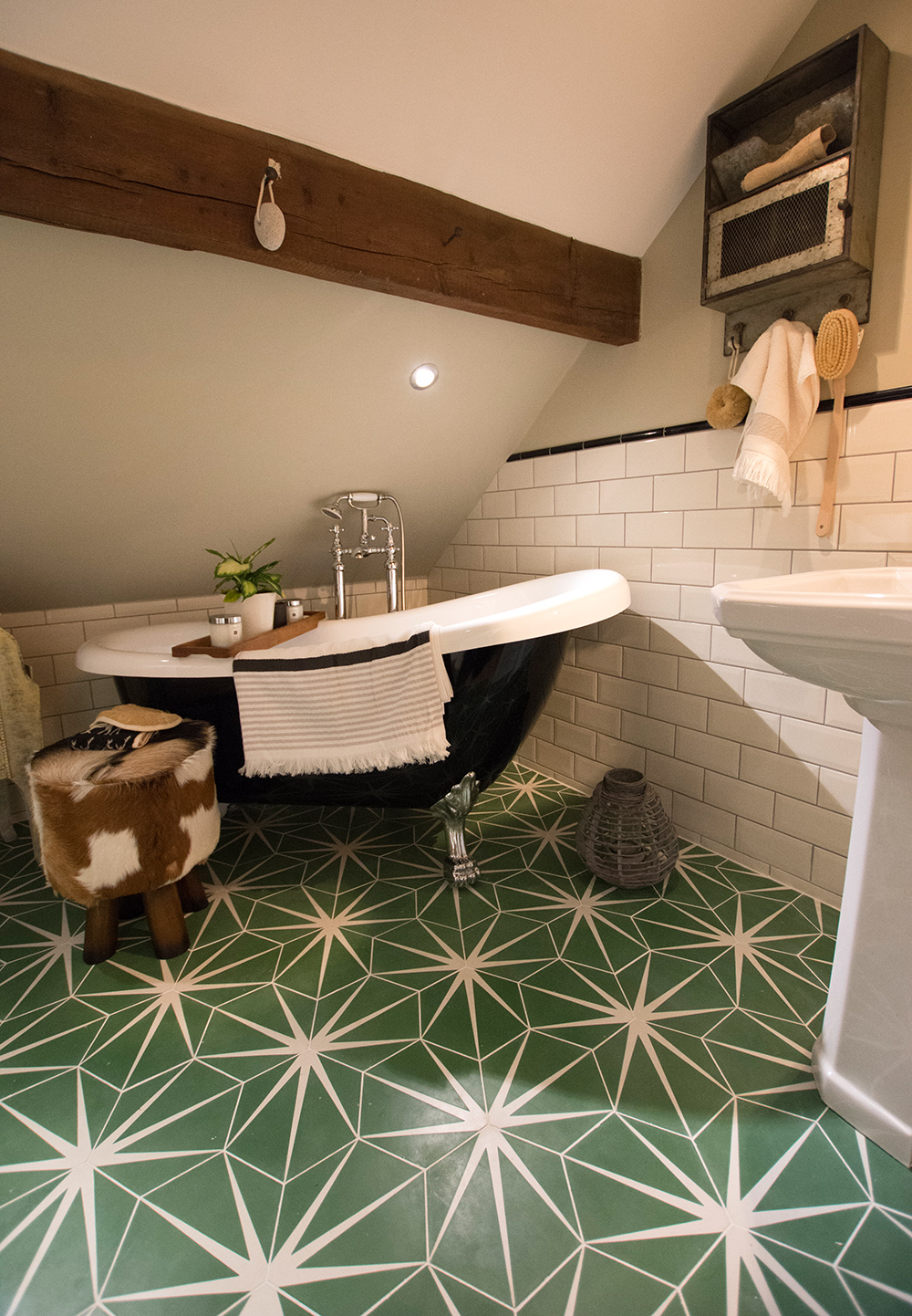 Nicola Broughton house tour - Beautiful bathroom decor with patterned green bathroom floor tiles