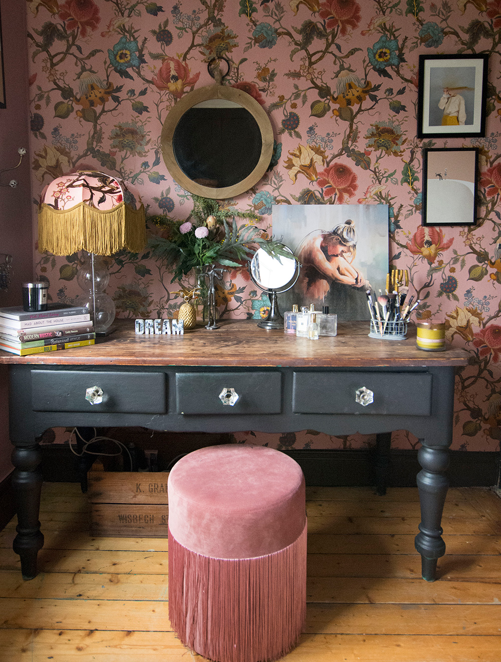 Vintage inspired, feminine dressing room decor with pink patterned wallpaper