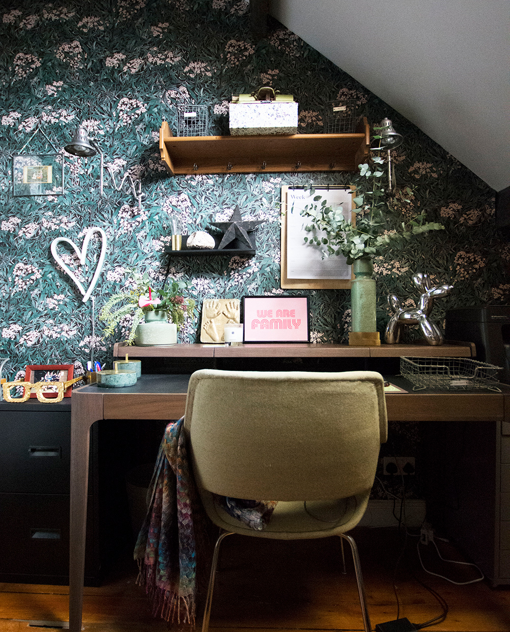 Quirky home office decor with pattered wallpaper