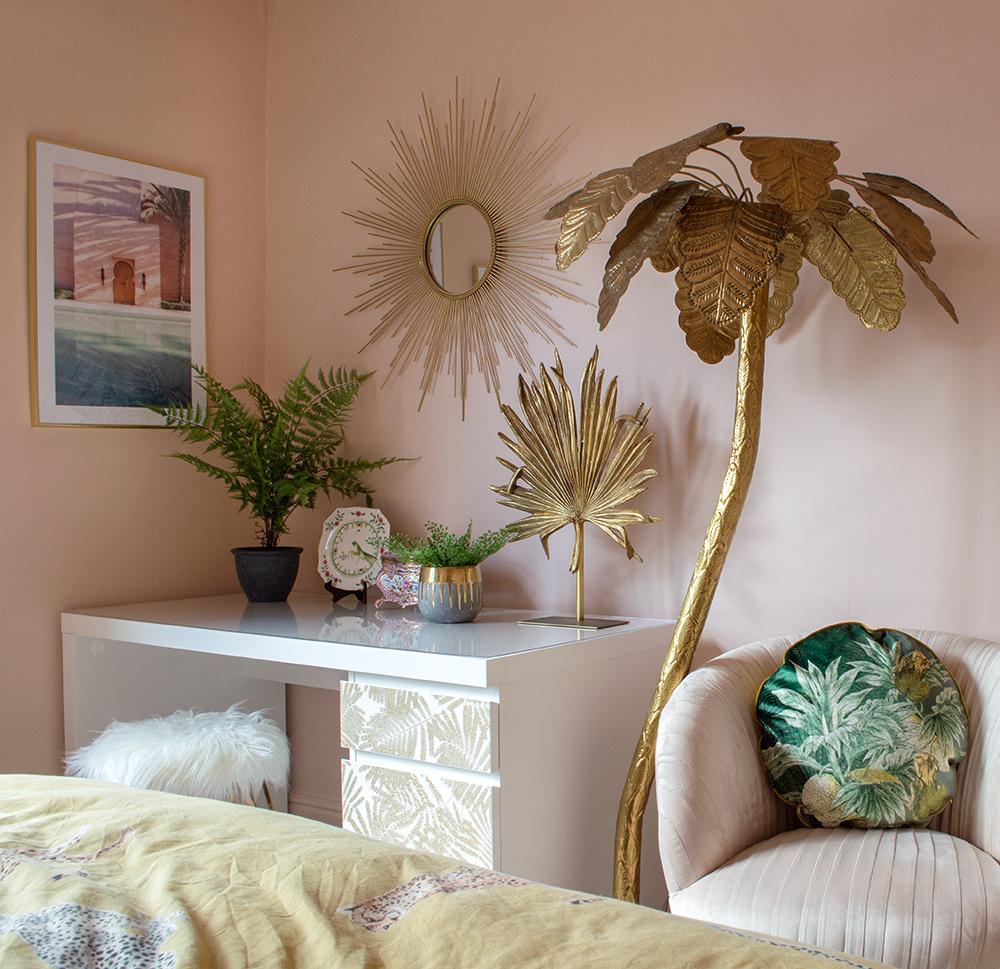 Stunning gold sunburst mirror styled in an Art Deco style bedroom. Blush pink and gold decor inspiration
