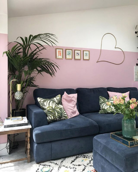 Half painted wall in the living room - pink and navy colour palette