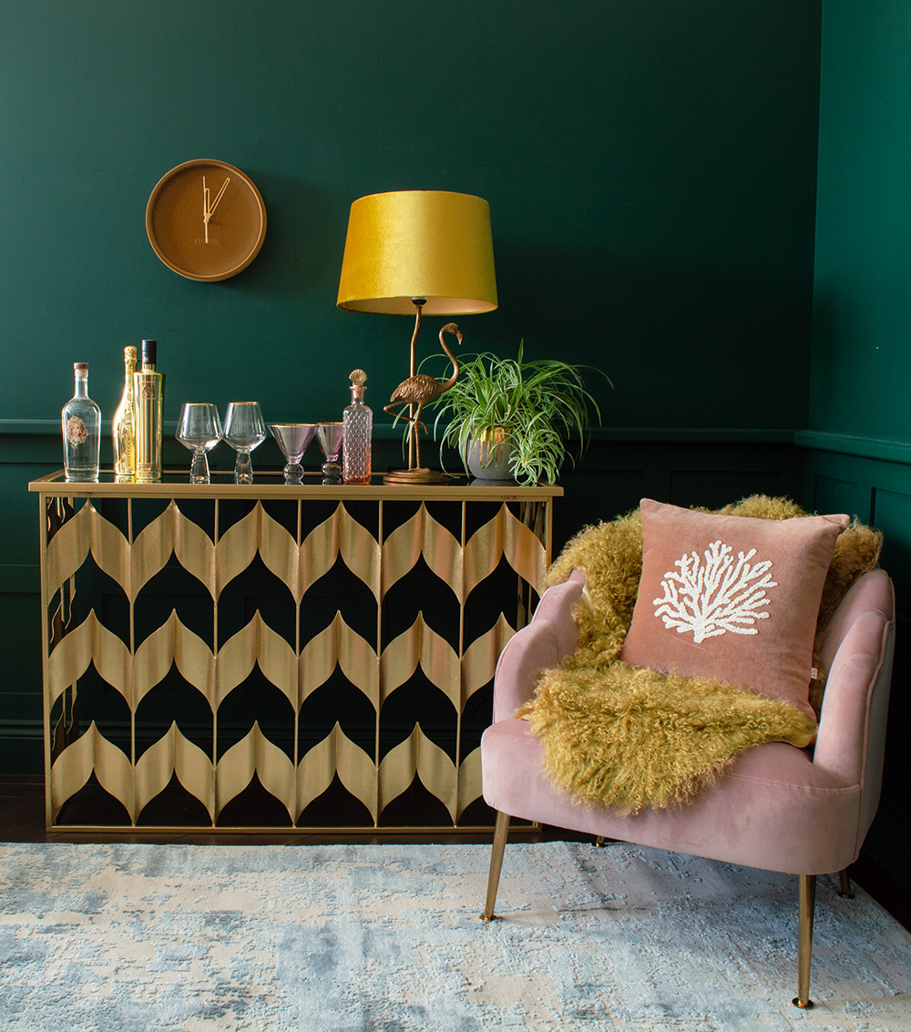 Gold chevron console table used as an alternative home bar!
