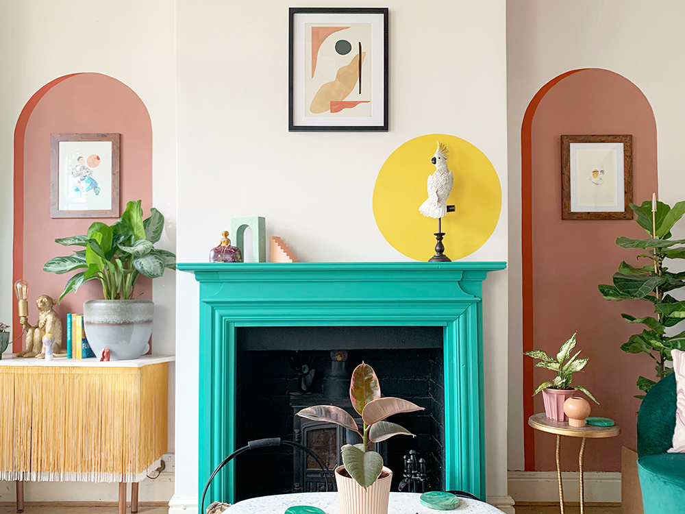 Colour blocking ideas and inspiration - painted arches for impact either side of teal fireplace