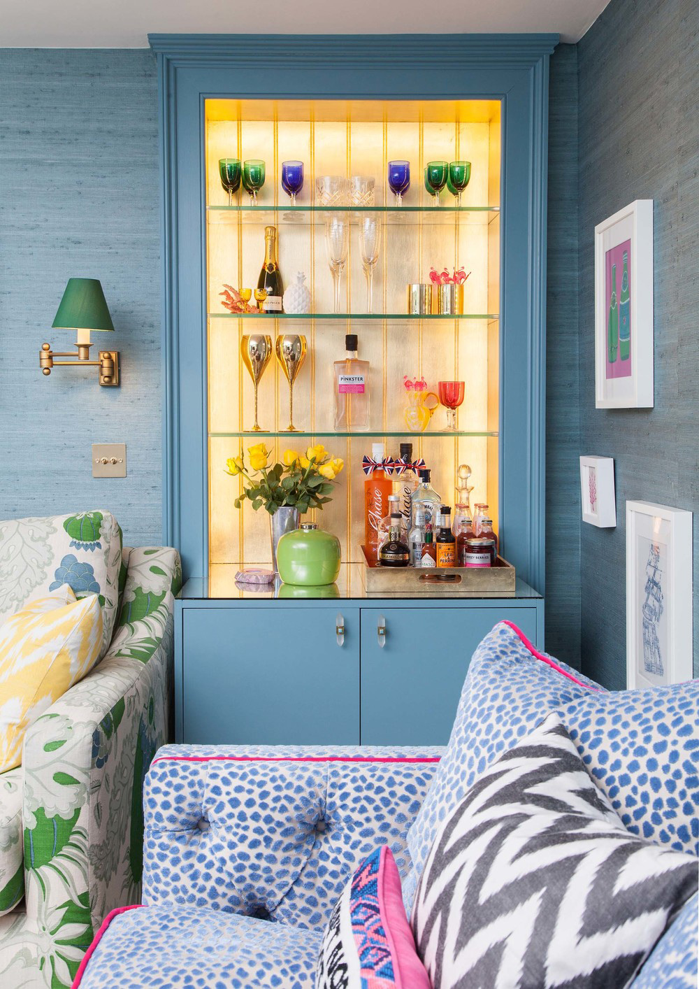 The Pink House cocktail cupboard in her living room 