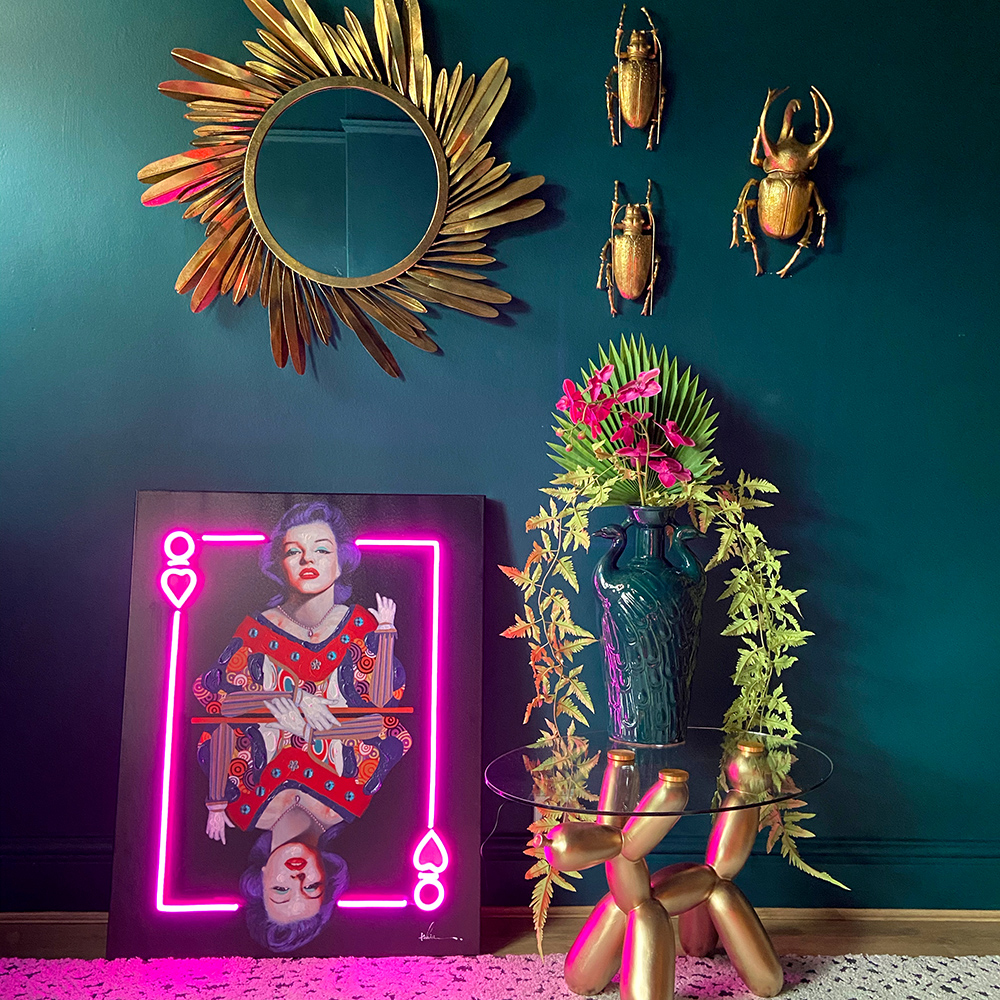 Pink Marilyn Monroe Neon Artwork styled with Golden Feather Wall Mirror, Gold Wall Beetles and Gold Balloon Dog Table