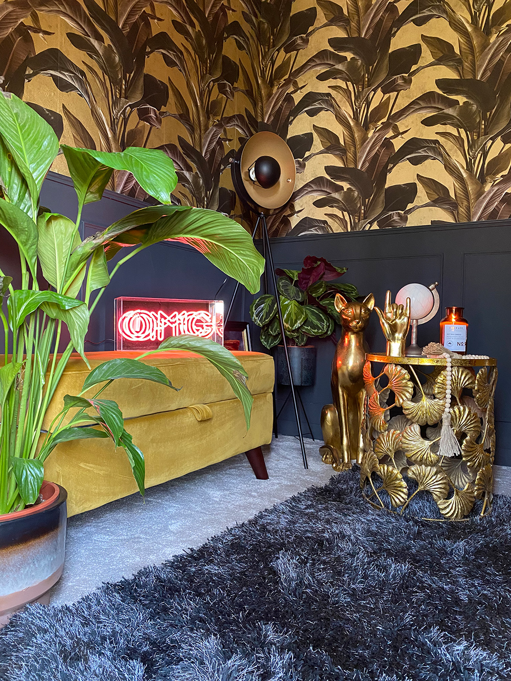Gorgeous decor by Glen of @inside.number.twelve. We love the metallic effect patterned wallpaper, styled with our Gold Ginkgo Leaf Side Table, Gold Rock On Hand, Gold Sphynx Cat and Pink OMG Neon Sign