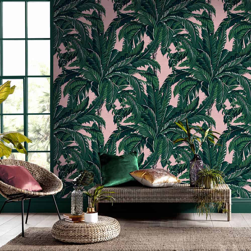 Pink and green tropical patterned wallpaper. Daintree Palm Blush wallpaper by Graham & Brown