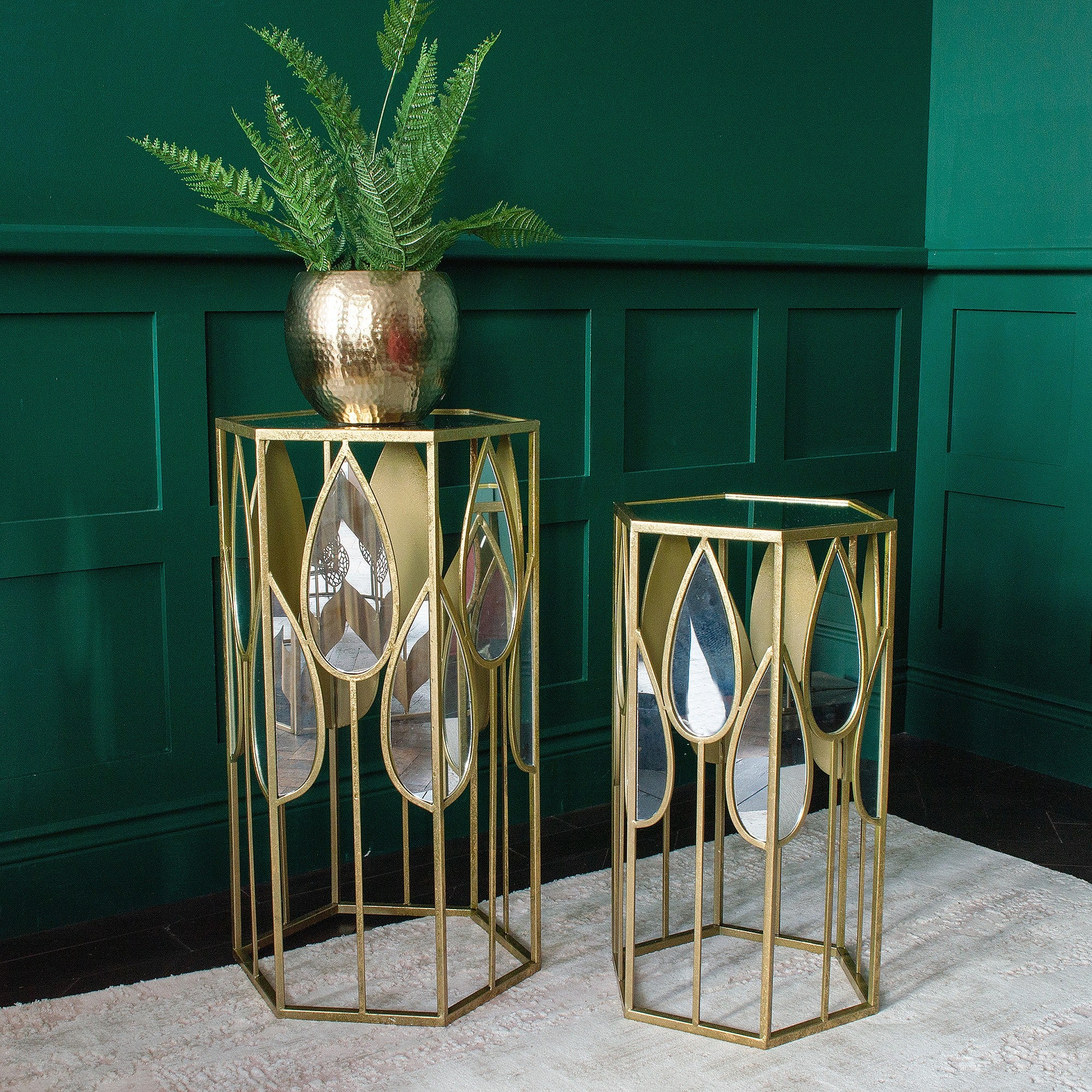 A gold mirrored nest of tables